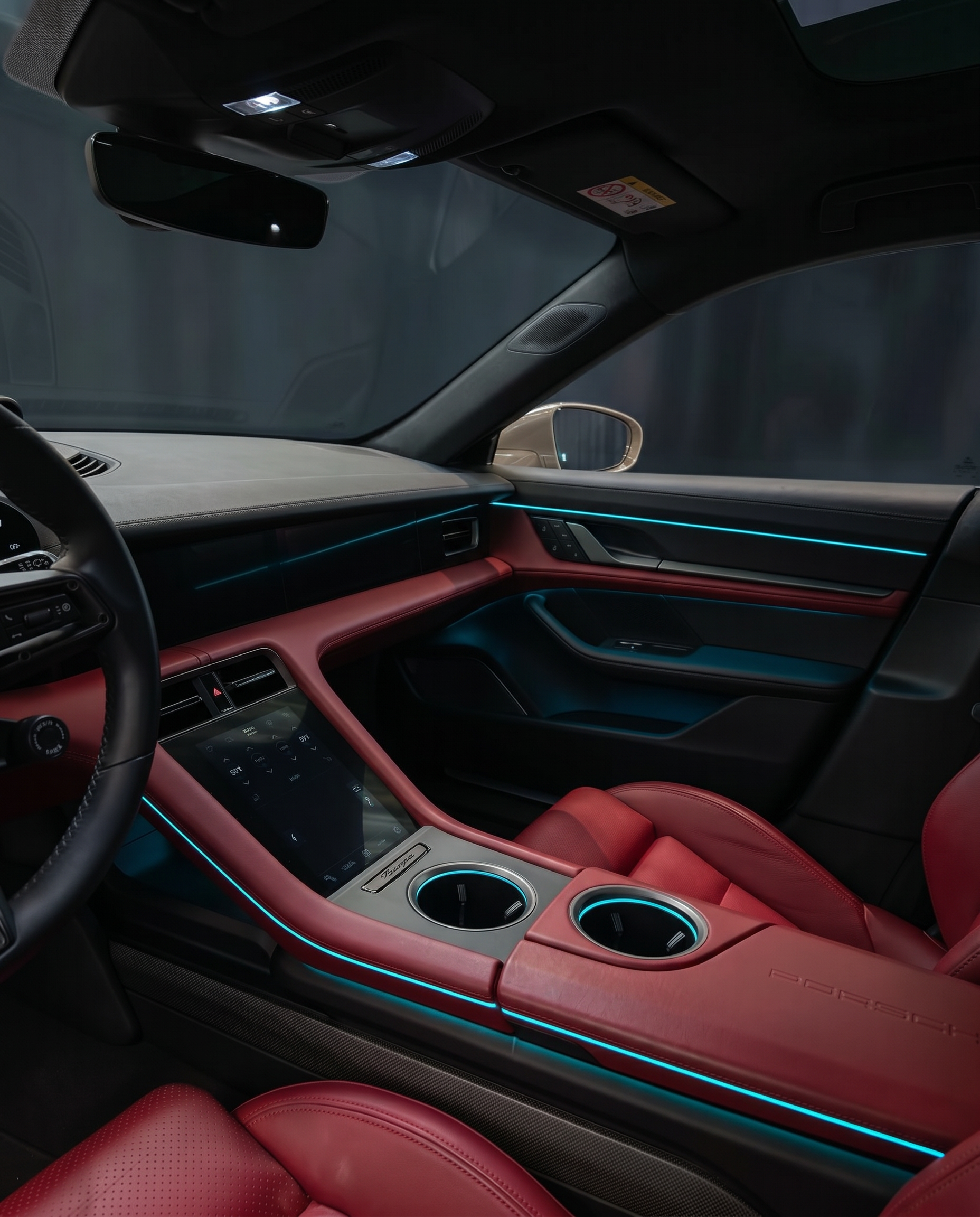 VYNTRA cyan fiber optic light along the door panel and center console