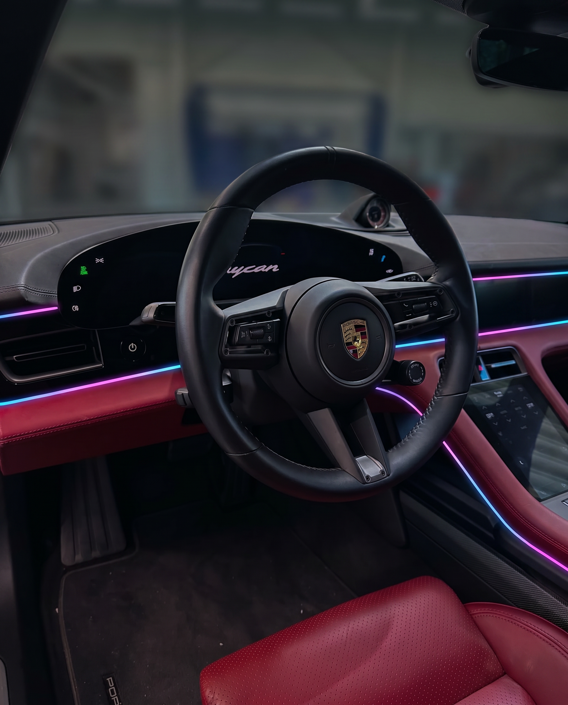 VYNTRA RGB ambient light in rainbow mode showing multiple colors in car interior